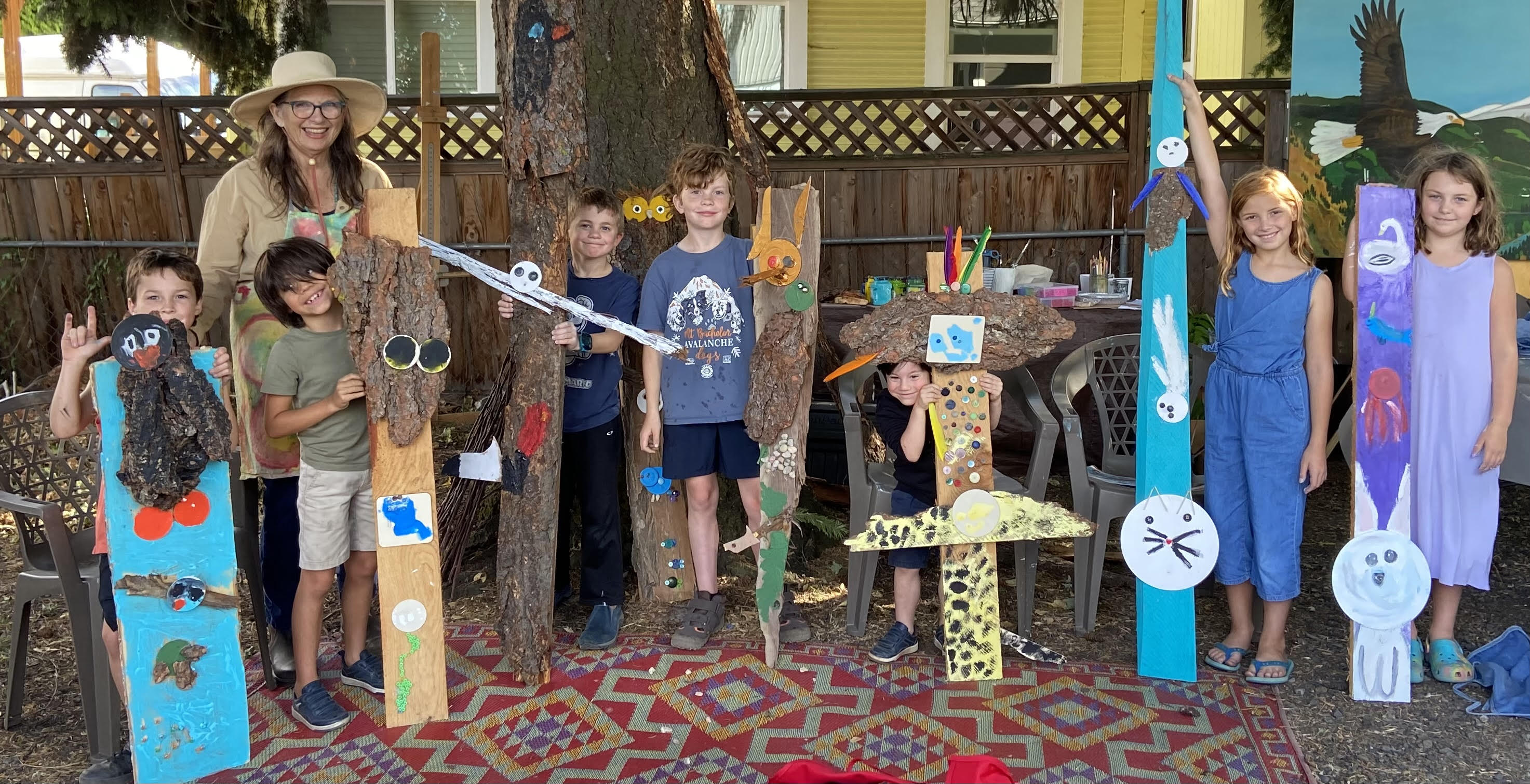 Totem poles representing animal or birds that are meaningful to the artist